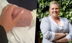 Elżbieta Romanowska trzyma za rękę bliską osobę, być może swojego męża, w trudnym momencie.