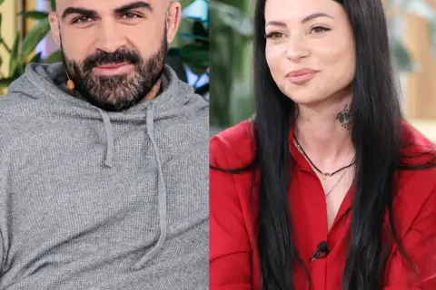 Akop i Sylwia Szostak, uśmiechnięci i patrzący w różne strony. On w szarej bluzie, ona w czerwonej koszuli.