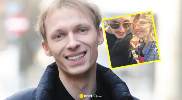 Igor Herbut z żoną na zdjęciu. Uśmiechnięty wokalista i jego ukochana w słoneczny dzień.