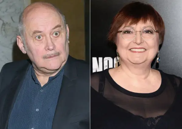 Grzegorz Warchoł z żoną, uśmiechnięta kobieta w okularach i mężczyzna z zaskoczonym wyrazem twarzy.